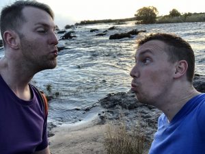 Carl and Thom Kissing Victoria Falls Zambia